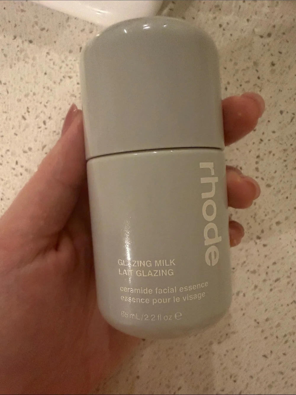 RHODE Glazing Milk Ceramide Facial Essence – Pale Gray Bottle